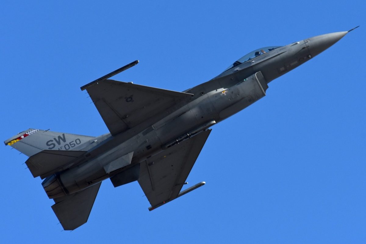 F-16 Fighting Falcons fly overhead during the New York Jets