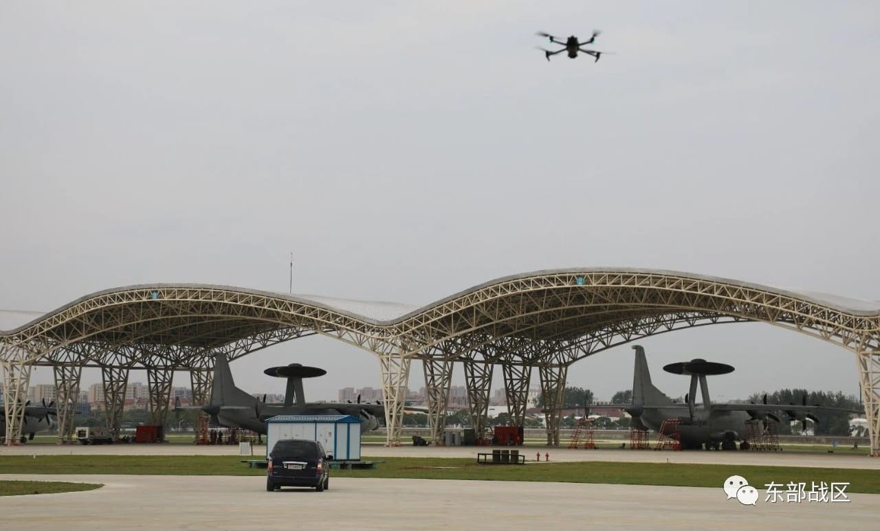 The target UAV quadcopter over the two hangars housing the KJ 500 AWACS